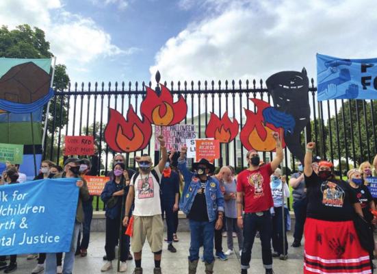 Indigenous environmental activists and allies protest in front of the White House at the People Vs. Fossil Fuels rally. (Robert Viamontes/Gaylord News)