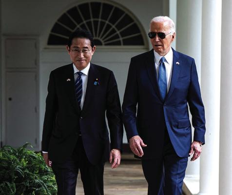 US PRESIDENT Joe Biden and Japanese Prime Minister Fumio Kishida walk along the colonnade of the White House in Washington, DC, on April 10, 2024. (Haiyun Jiang/Pool/AFP via Getty Images/TNS)