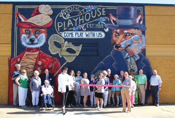 THE PONCA Playhouse debuted a new mural on the north side of their building with a ribbon cutting ceremony at 5 pm on Tuesday, May 21. The mural features foxes to tie-in with other murals and artwork around down, and was painted by local artist Theresa Sacket, who has painted several fox statutes and the Hartford underpass murals. The Ponca Playhouse is located at 301 S. 1st Street in Ponca City and is a community theatre with a black box performance space. For more information on upcoming shows and events,